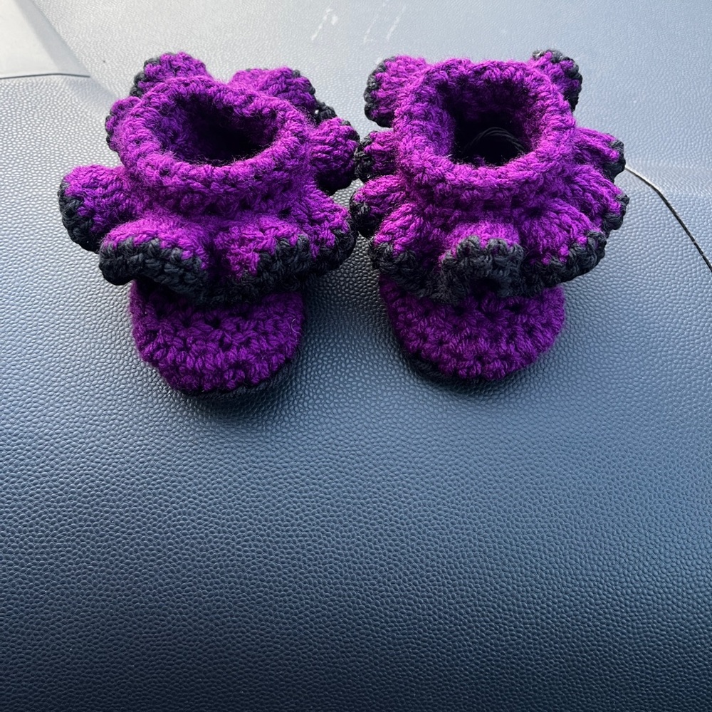 Purple and black baby booties